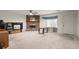Living room featuring a brick fireplace and large window at 2616 Landington Nw Way, Duluth, GA 30096