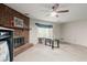 Living room with brick fireplace and glass-top coffee table at 2616 Landington Nw Way, Duluth, GA 30096