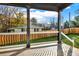 Back porch with a view of the backyard and surrounding trees at 4562 Spring St, Acworth, GA 30101