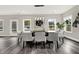Modern dining room with hardwood floors and large windows at 4562 Spring St, Acworth, GA 30101