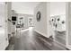 Open living and kitchen area with gray flooring and lots of natural light at 4562 Spring St, Acworth, GA 30101