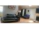 Cozy living room featuring hardwood floors, and a comfortable seating arrangement at 764 Avalon Forest Way, Lawrenceville, GA 30044