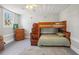 Bedroom with wooden bunk bed and dresser at 14299 Highway 36, Covington, GA 30014