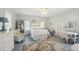 Bright bedroom featuring a white metal bed frame and wicker furniture at 14299 Highway 36, Covington, GA 30014