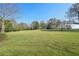 Two story home with large yard and trees at 14299 Highway 36, Covington, GA 30014
