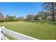 White fence with distant view of home at 14299 Highway 36, Covington, GA 30014