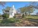Two-story house with large backyard and mature trees at 14299 Highway 36, Covington, GA 30014