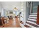 Living room with hardwood floors, fireplace, and built-in shelving at 14299 Highway 36, Covington, GA 30014