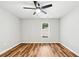 Bright bedroom with wood flooring and ceiling fan at 124 Cagle Way, Hiram, GA 30141