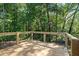 Wooden deck overlooking a lush wooded backyard at 124 Cagle Way, Hiram, GA 30141