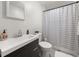 Clean bathroom featuring a shower/tub combo, toilet and vanity at 1671 S Gordon Sw St, Atlanta, GA 30310