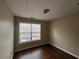 Spacious bedroom with hardwood floors and large window at 87 Hollinger Way, Marietta, GA 30060