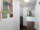 Bright hallway with coat closets and artwork at 75 Fair Haven Se Way, Smyrna, GA 30080