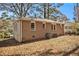 Brick ranch house with a large backyard at 1425 Cobb Branch Dr, Decatur, GA 30032