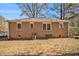 Brick ranch house with a large backyard at 1425 Cobb Branch Dr, Decatur, GA 30032