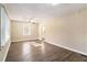 Spacious living room featuring hardwood floors and a ceiling fan at 1425 Cobb Branch Dr, Decatur, GA 30032
