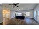 Open living space with hardwood floors and kitchen views at 2152 Castlewood St, East Point, GA 30344