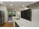 Modern kitchen with stainless steel appliances and granite countertops at 1584 Tallulah Nw St, Atlanta, GA 30318