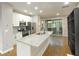 Modern kitchen with granite countertops and island at 1584 Tallulah Nw St, Atlanta, GA 30318