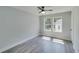 Bright bedroom with hardwood floors and dual windows at 2381 Highpoint Rd, Snellville, GA 30078