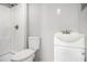 Clean bathroom with a shower, toilet, and pedestal sink at 3209 Dover Dr, Duluth, GA 30096