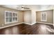 Large bedroom with hardwood floors and plenty of natural light at 5204 Camden Lake Nw Pkwy, Acworth, GA 30101