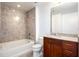 Bathroom with tub, shower, and wood vanity at 361 17Th Nw St # 1618, Atlanta, GA 30363