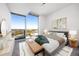 Main bedroom with city views and stylish furniture at 361 17Th Nw St # 1618, Atlanta, GA 30363