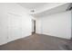 Spacious bedroom with grey carpet and ample closet space at 361 17Th Nw St # 1618, Atlanta, GA 30363