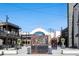 Outdoor community space with string lights and shops at 361 17Th Nw St # 1618, Atlanta, GA 30363