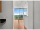 Hardwood floor hallway with view of living room and city view at 361 17Th Nw St # 1618, Atlanta, GA 30363