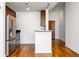 Modern kitchen features stainless steel appliances and hardwood floors at 361 17Th Nw St # 1618, Atlanta, GA 30363