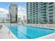 Resort-style pool with plenty of lounge chairs at 361 17Th Nw St # 1618, Atlanta, GA 30363