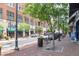 Brick-paved street with shops and trees providing a lively atmosphere at 361 17Th Nw St # 1618, Atlanta, GA 30363