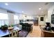 Bright and airy kitchen with white cabinets, stainless steel appliances, and hardwood floors at 120 Lismore Ct, Tyrone, GA 30290