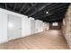 Finished basement offers an open layout with neutral walls and new flooring at 3645 Aldea Dr, Decatur, GA 30032