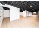 Spacious finished basement with exposed stone wall at 3645 Aldea Dr, Decatur, GA 30032