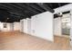 Spacious finished basement features multiple rooms and updated flooring at 3645 Aldea Dr, Decatur, GA 30032