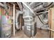 Unfinished basement with HVAC system, water heater, and electrical panel at 3645 Aldea Dr, Decatur, GA 30032
