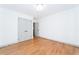 Spacious bedroom with hardwood floors and built-in closet at 3645 Aldea Dr, Decatur, GA 30032