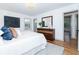 Spacious primary bedroom with hardwood floors and ensuite access at 3645 Aldea Dr, Decatur, GA 30032