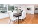 Modern dining room with hardwood floors and large windows at 3645 Aldea Dr, Decatur, GA 30032