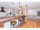 Modern kitchen with wooden island and hardwood floors at 3645 Aldea Dr, Decatur, GA 30032