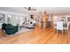 Open-concept living space with hardwood floors and stylish seating at 3645 Aldea Dr, Decatur, GA 30032
