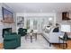 Open living space featuring a fireplace and access to the deck at 3645 Aldea Dr, Decatur, GA 30032