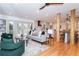 Open concept living and kitchen with hardwood floors and island at 3645 Aldea Dr, Decatur, GA 30032