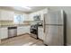 Updated kitchen featuring stainless steel appliances and granite countertops at 2543 Brentwood Rd, Decatur, GA 30032