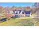 Spacious two-story home with a large yard and detached garage at 3975 Mcconnell Rd, Cumming, GA 30028