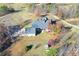 Aerial view of house, detached garage, and large backyard at 3975 Mcconnell Rd, Cumming, GA 30028
