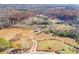 Aerial view of multiple homes situated on a large lot at 3975 Mcconnell Rd, Cumming, GA 30028